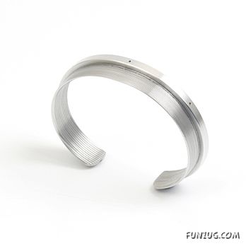 Vision Bracelets Made from Discarded Camera Lenses