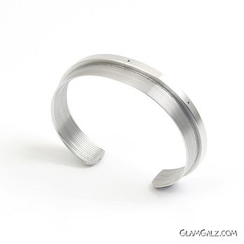 Vision Bracelets Made from Discarded Camera Lenses